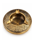 Mehfil round brass ashtray with an embossed paisley and floral rim, on a white background